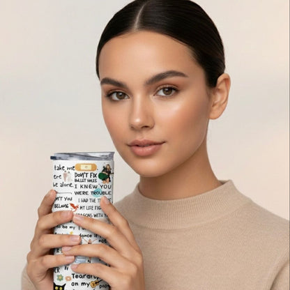 Woman holding a Taylor Swift  tumbler with text and graphics on a plain background