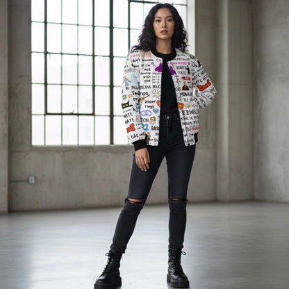 Woman wearing a colorful patterned  Taylor Swift jacket in an industrial-style room.