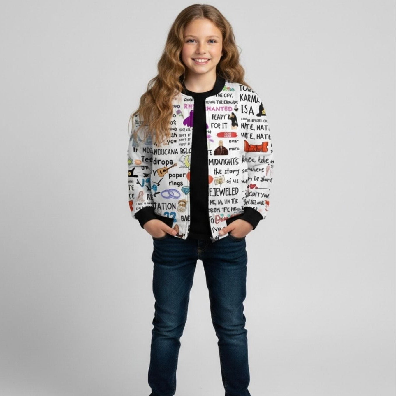 Young girl wearing a colorful  Taylor Swift jacket with text design on a plain background