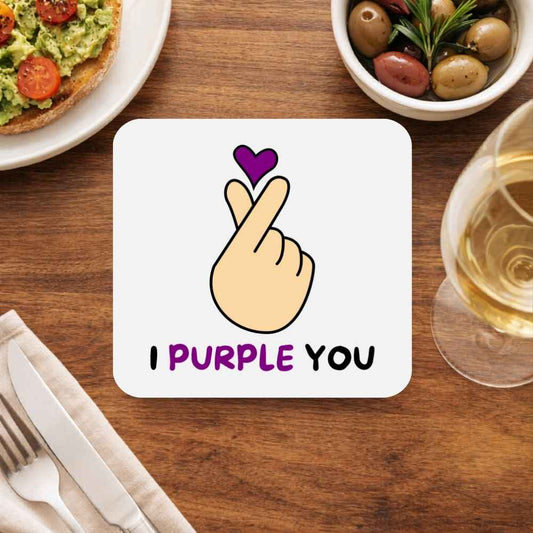 BTS I Purple You coaster with Korean finger heart and purple love text on wooden dining table – meaningful K-pop collectible drink coaster and heartfelt fan gift for BTS ARMY