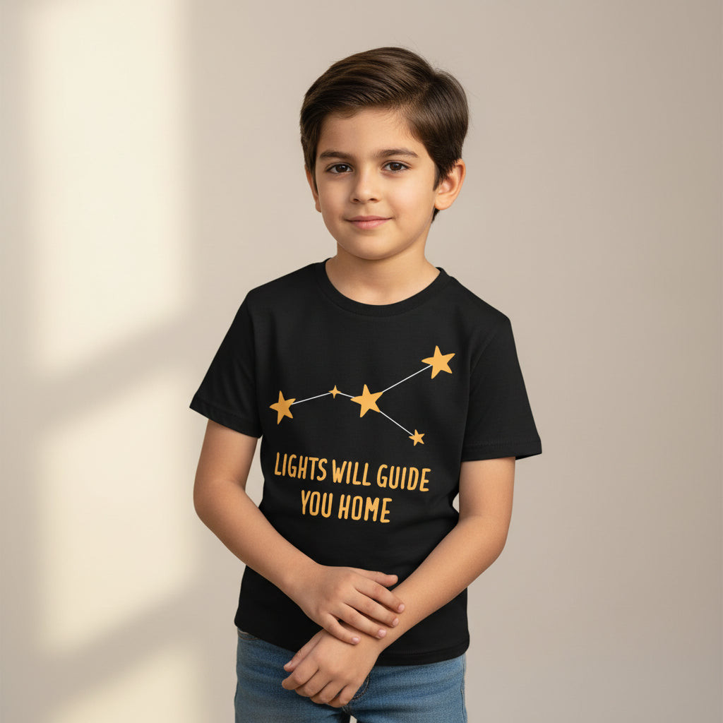 Black t-shirt with yellow star design and text 'LIGHTS WILL GUIDE YOU HOME' on a white background coldplay the bnayan tee 