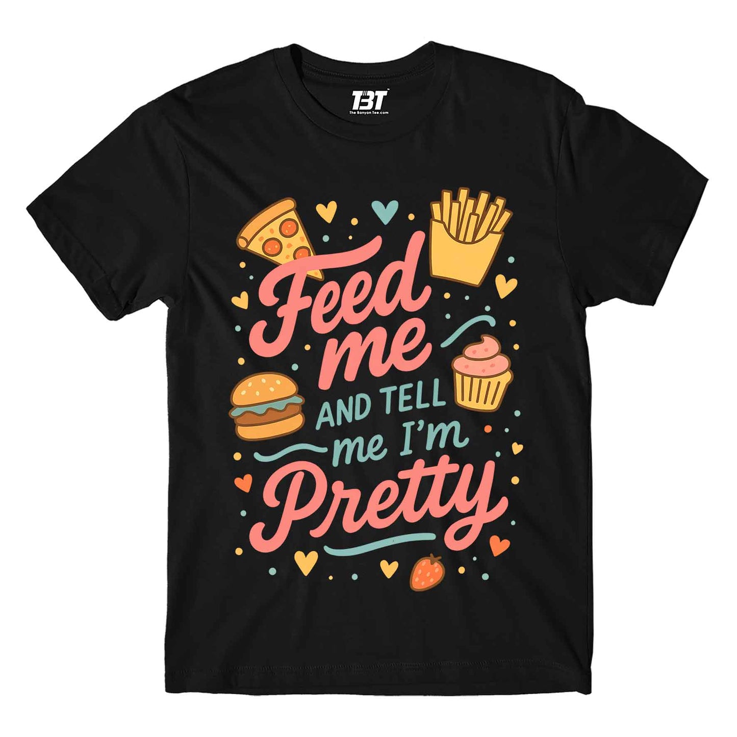 Black t-shirt with colorful graphics and text 'Feed me and tell me I'm pretty' on a white background