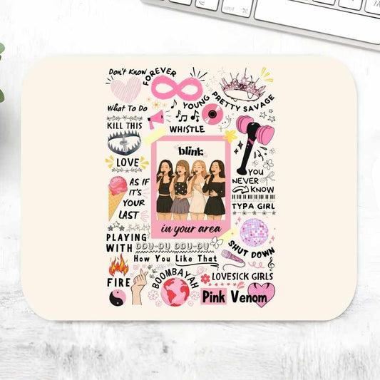 Mouse pad with text and graphics on a white surface. Black Pink Mousepad.