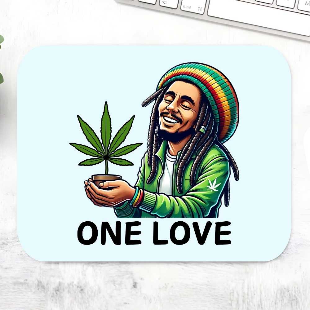 Mouse pad with a graphic of a person holding a cannabis plant and 'ONE LOVE' text on a light blue background. Bob Marley