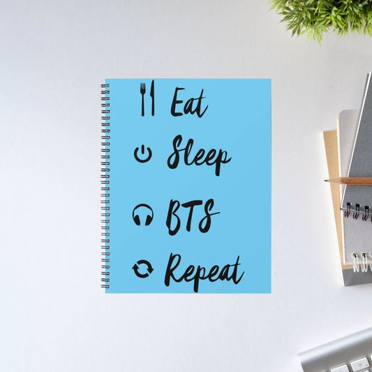 Eat Sleep BTS Repeat spiral notebook with blue cover and fun K-pop fandom typography – humorous and trendy journal gift for K-pop fans, BTS ARMY, and Korean music enthusiasts