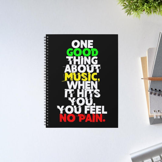 Notebook with motivational quote on a white surface Bob Marley Gift Merch The Banyan Tee