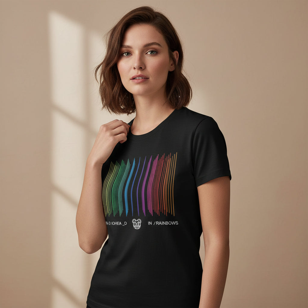 Black t-shirt with colorful barcode design and band name on a white background radiohead in rainbows the banyan tee
